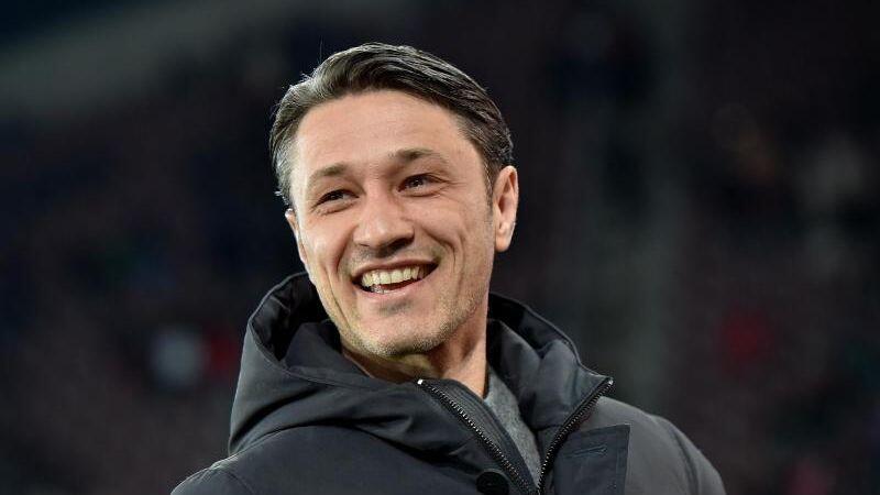 Münchens Trainer Niko Kovac lächelt vor dem Spiel. Foto: Angelika Warmuth/Archiv