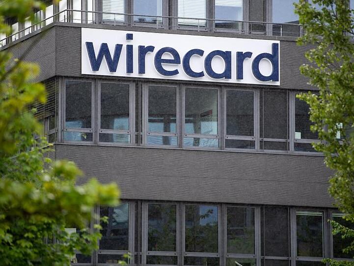 Der Schriftzug von Wirecard ist an der Firmenzentrale des Zahlungsdienstleisters zu sehen. Foto: Sven Hoppe/dpa/Archivbild