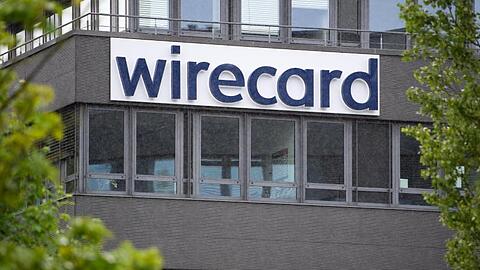 Der Schriftzug von Wirecard ist an der Firmenzentrale des Zahlungsdienstleisters zu sehen. Foto: Sven Hoppe/dpa/Archivbild