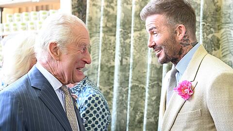 Plaudern sie hier schon über den Ritterschlag? König Charles und David Beckham im Mai bei einem gemeinsamen Auftritt.
