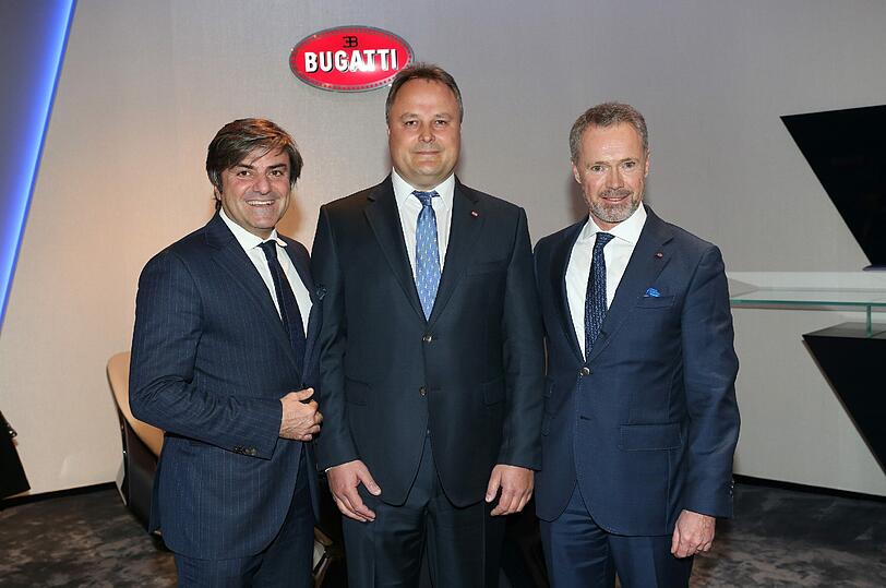 Massimiliano Ferrari (Bugatti) mit Rainer Dörr und Dr. Stefan Brungs (Bugatti)