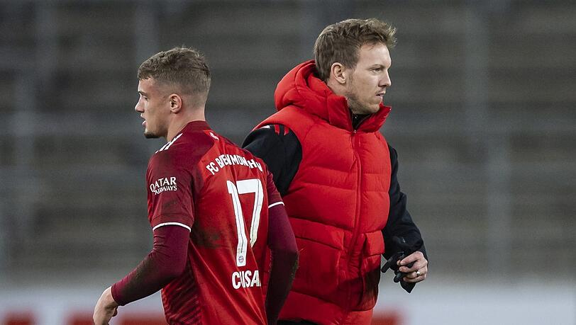 Wenig Spielzeit: Cuisanceund Bayern-TrainerJulian Nagelsmann.