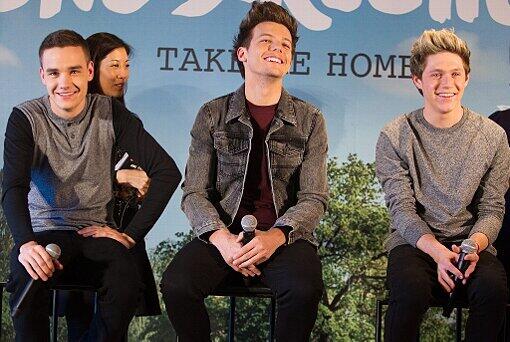 Liam Payne, Louis Tomlinson und Niall Horan auf einer Pressekonferenz in Tokio