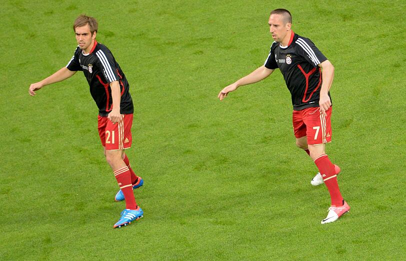Lahm und Ribery beim Aufwärmen.