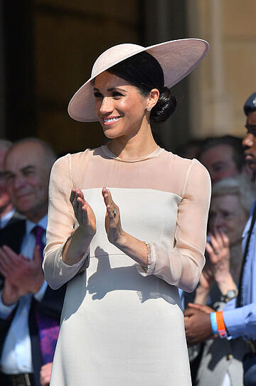 Ehe-Glück: Herzogin Meghan und Prinz Harry kommen zu einem Gartenfest im Buckingham Palace. Es ist der erste öffentliche Auftritt nach ihrer Hochzeit am 19. Mai.
