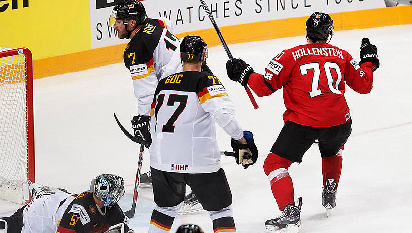 Das deutsche Eishockey-Team ist erneut geschlagen: Denis Hollenstein jubelt über seinen Siegtreffer für die Schweiz. Das deutsche Eishockey-Team ist erneut geschlagen: Denis Hollenstein jubelt über seinen Siegtreffer für die Schweiz.