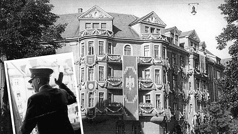 1938: Adolf Hitlers Privatwohnung mit Fahnenschmuck am Prinzregentenplatz 16. Edgar Feuchtwanger lebte damals schräg gegenüber.