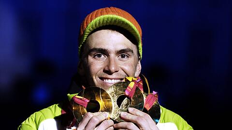 Drei Mal Gold bei Olympia 2006 in Turin: Biathlon-Star Michael Greis traut
Franziska Preu&szlig; bei den Spielen jetzt viel zu.