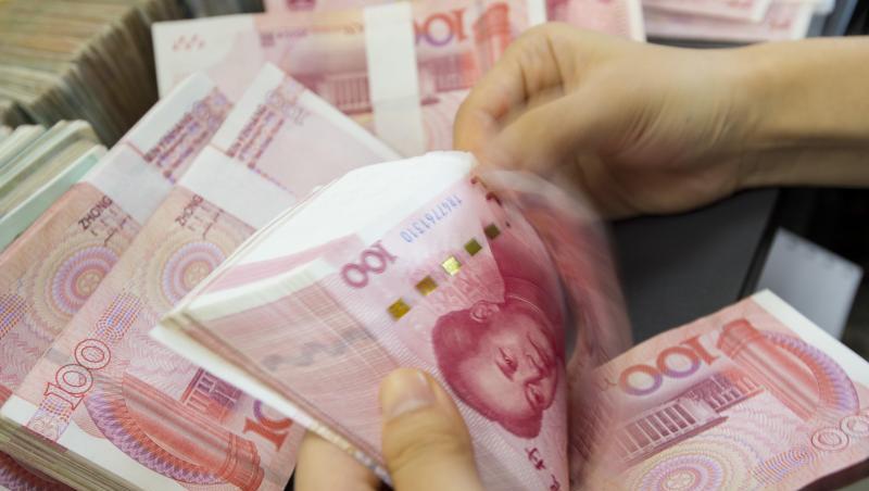 Yuan-Geldscheine: Chinas Wirtschaft hat sich in den vergangenen Quartalen abgekühlt. Yuan-Geldscheine: Chinas Wirtschaft hat sich in den vergangenen Quartalen abgekühlt.