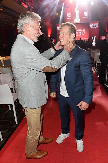 Paul Breitner und Fabian Hambüchen
