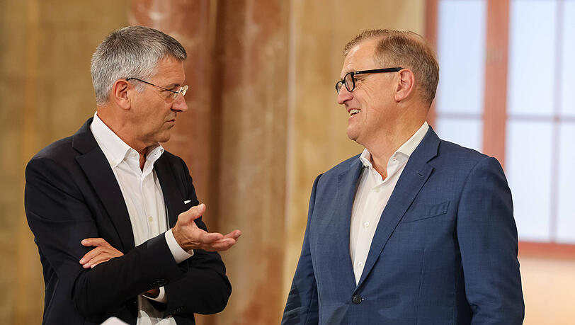 Hainer im Austausch mit Bayerns Vorstandschef Jan-Christian Dreesen (r.). Hainer im Austausch mit Bayerns Vorstandschef Jan-Christian Dreesen (r.).