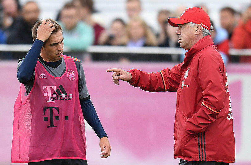 Nicht unbedingt auf einer Wellenlänge: Bayern-Kapitän Philipp Lahm (links) und Trainer Carlo Ancelotti.