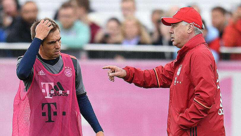 Nicht unbedingt auf einer Wellenlänge: Bayern-Kapitän Philipp Lahm (links) und Trainer Carlo Ancelotti. Nicht unbedingt auf einer Wellenlänge: Bayern-Kapitän Philipp Lahm (links) und Trainer Carlo Ancelotti.