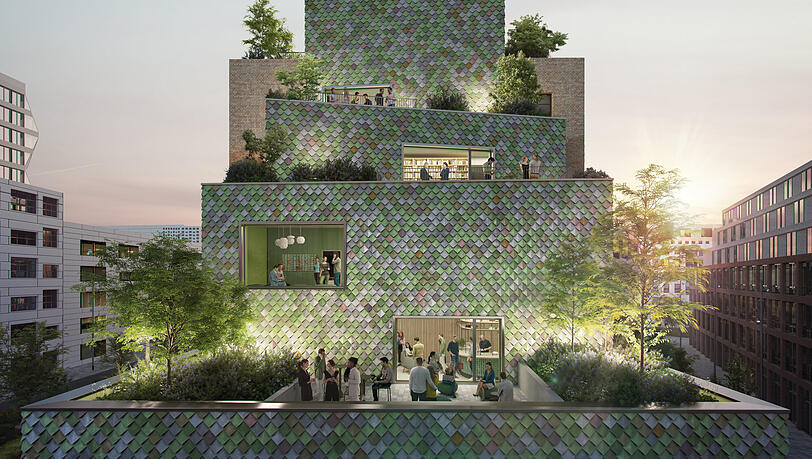 Auch ungewöhnliche Bürobauten entstehen derzeit im Werksviertel: wie das "Monaco" mit 20.000 recycelten Fliesen an der Fassade. Auch ungewöhnliche Bürobauten entstehen derzeit im Werksviertel: wie das "Monaco" mit 20.000 recycelten Fliesen an der Fassade.