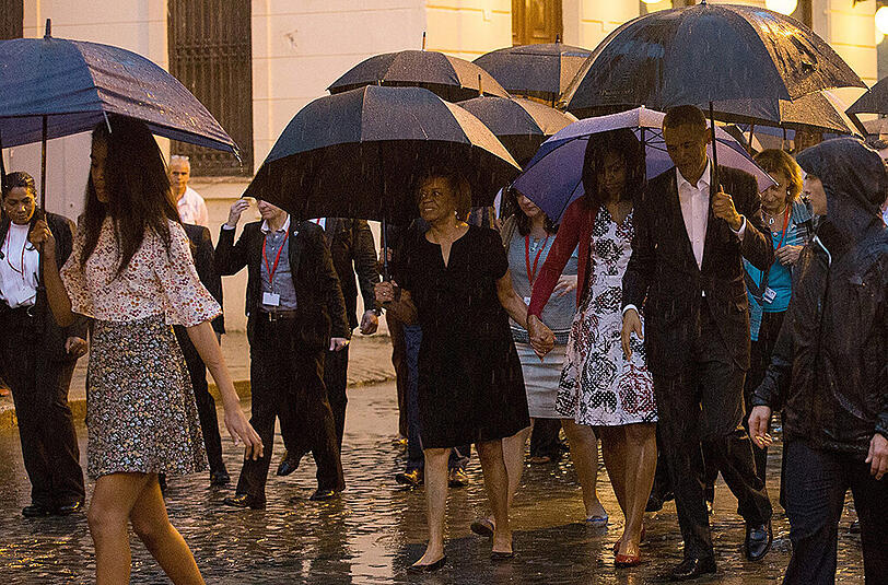 Im strömenden Regen: US-Präsident Barack Obama und First Lady Michelle in Havanna.
