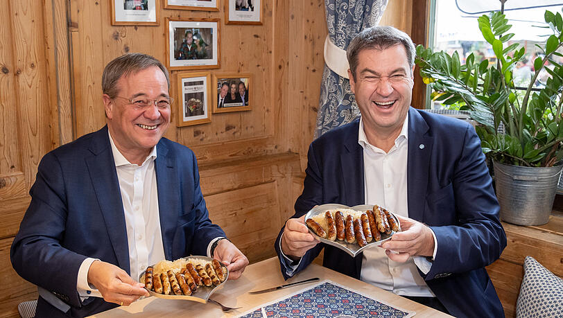 September 2021: Markus Söder (r.) und Armin Laschet in Nürnberg beim Bratwurst essen.