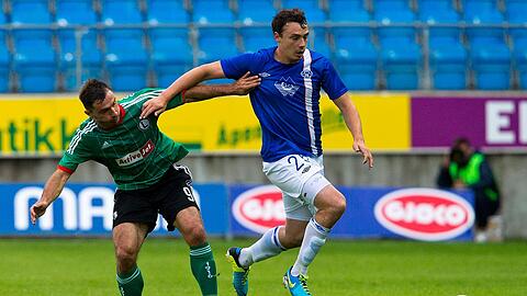 Hat knapp 300 Pflichtspiele für Molde FK auf dem Konto: Innenverteidiger Vegard Forren (r.). Heuert er jetzt beim TSV 1860 an?