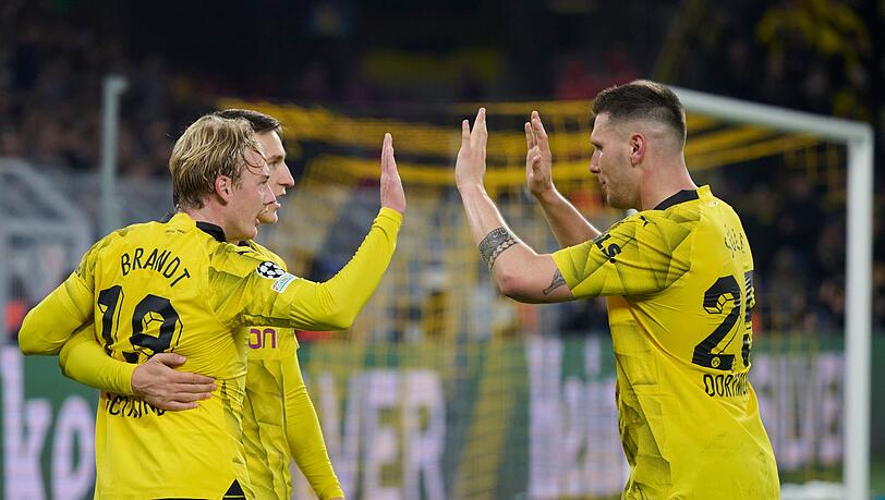 Der BVB um Julian Brandt, Nico Schlotterbeck und Niklas Süle (l-r) setzte sich gegen Newcastle durch.