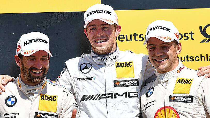 Das vorläufige Siegerpodest:  Der Zweitplatzierte Timo Glock (l-r) aus Deutschland vom BMW Team RMG, der Gewinner Paul di Resta aus Großbritannien vom Mercedes-AMG Team HWA und der Dritte Augusto Farfus aus Brasilien vom BMW Team MTEK. Glock wurde nach dem Rennen disqualifiziert.
