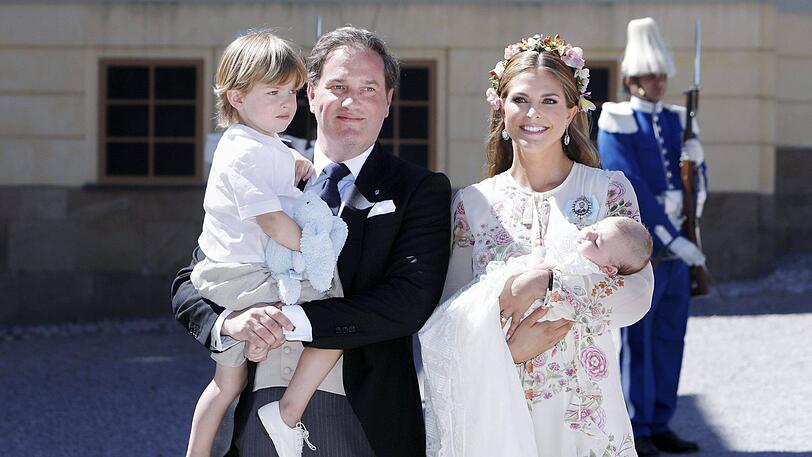 Prinzessin Madeleine mit Prinz Nicolas und Chris O&rsquo;Neill mit Prinzessin Adrienne.