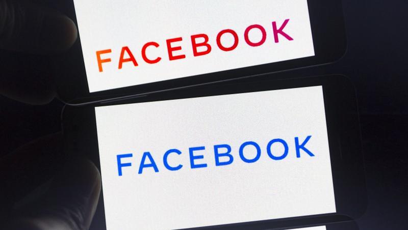 Das neue Firmenlogo von Facebook auf einem Smartphone-Bildschirm. Das neue Firmenlogo von Facebook auf einem Smartphone-Bildschirm.