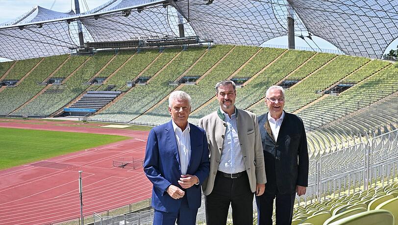 Drei für Olympia: Dieter Reiter, Markus Söder und Joachim Herrmann im Olympiastadion.
