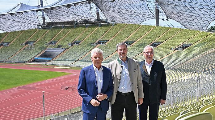 Drei für Olympia: Dieter Reiter, Markus Söder und Joachim Herrmann im Olympiastadion.