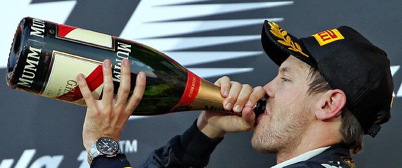 Die ganz große Vettel-Party: So lässt es der alte neue Weltmeister in Suzuka krachen. Die Bilder