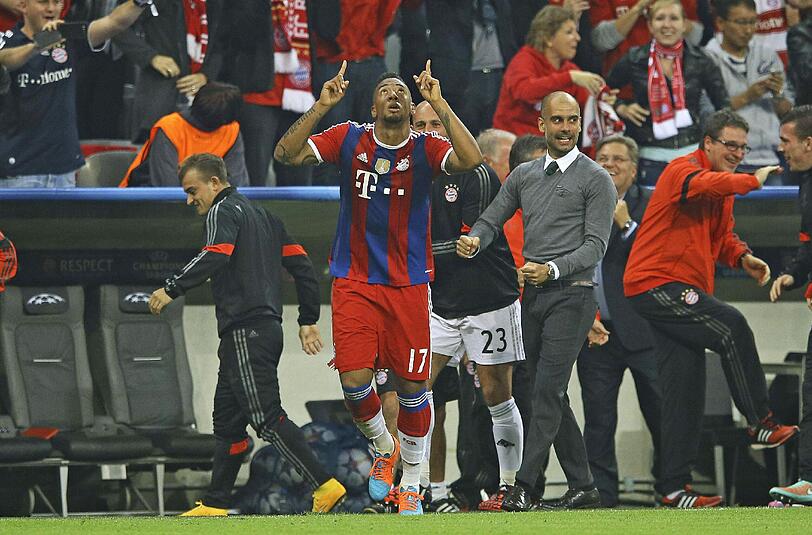 Match-Winner Jerome Boateng (l.) bekommt viel Lob von Trainer Pep Guradiola.
