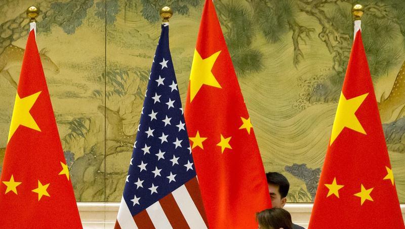 Flaggen von China und den USA vor den Handelsgesprächen im Februar in Peking. Flaggen von China und den USA vor den Handelsgesprächen im Februar in Peking.