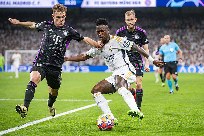 Hei&szlig;es Duell: Joshua Kimmich (l.) gegen Vinicius Junior im Halbfinale 2024.
