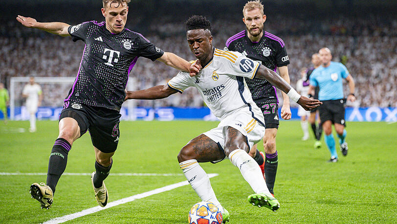 Hei&szlig;es Duell: Joshua Kimmich (l.) gegen Vinicius Junior im Halbfinale 2024.