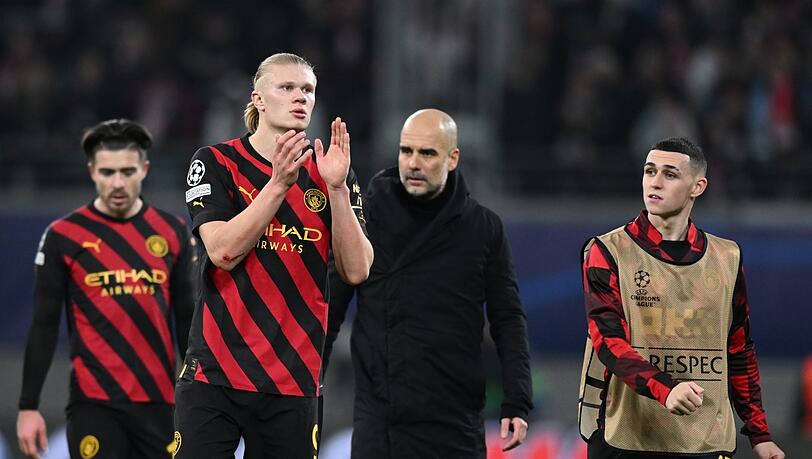 Wird er fit bis zum Champions-League-Gipfel gegen den FC Bayern am 11. April? Manchester Citys Erling Haaland (2.v.l.). Wird er fit bis zum Champions-League-Gipfel gegen den FC Bayern am 11. April? Manchester Citys Erling Haaland (2.v.l.).