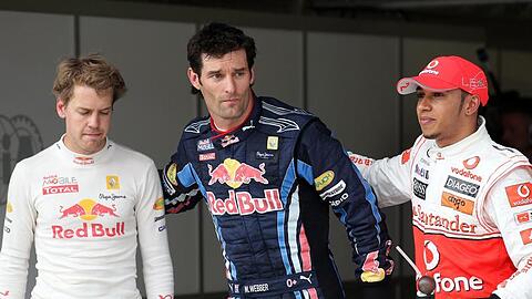 Der enttäuschte Sebastian Vettel mit Teamkollege Webber und Louis Hamilton.