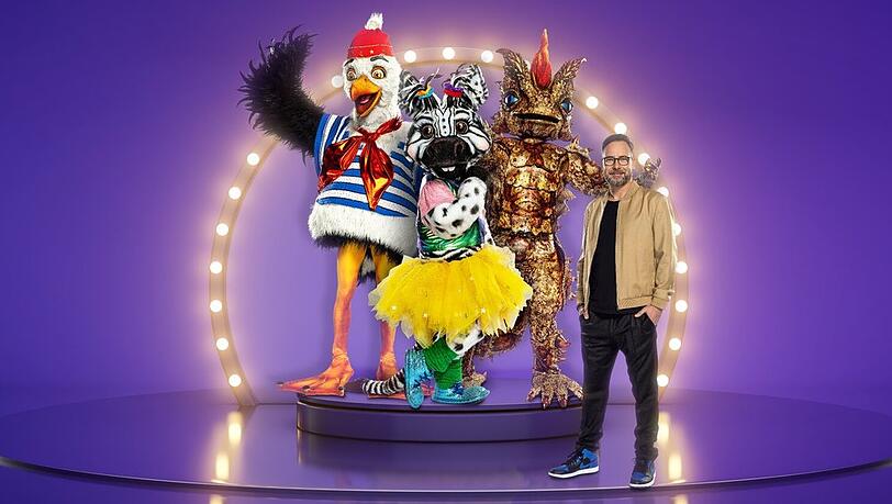 Matthias Opdenhövel und drei der neuen "Masked Singer"-Masken: Möwe, Zebra und Dornteufel.