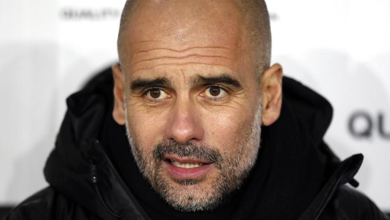 Pep Guardiola, Trainer von Manchester City, sitzt auf der Trainerbank vor dem Spiel. Foto: Martin Rickett/PA Wire/dpa Pep Guardiola, Trainer von Manchester City, sitzt auf der Trainerbank vor dem Spiel. Foto: Martin Rickett/PA Wire/dpa