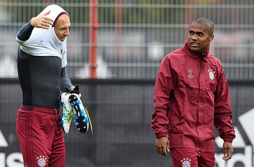 Arjen Robben (links) und Douglas Costa.