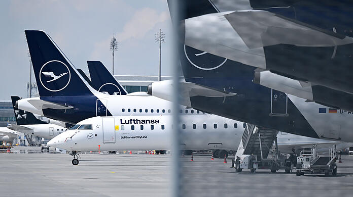Flugzeuge der Lufthansa und der Lufthansa CityLine stehen am Flughafen München. (Archivbild) Flugzeuge der Lufthansa und der Lufthansa CityLine stehen am Flughafen München. (Archivbild)