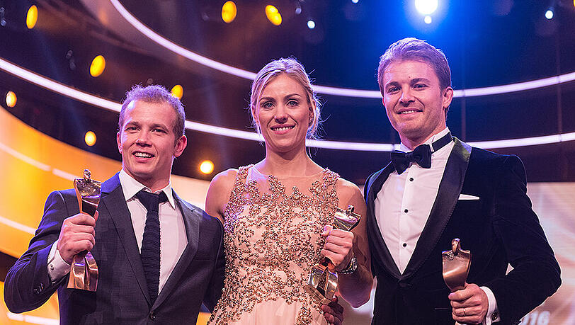 Gruppenbild mit Siegern. Fabian Hambüchen, Angelique Kerber und Nico Rosberg.