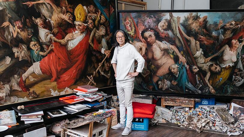Maler Yongbo Zhao, der seit 25 Jahren ein Atelier am Domagkpark hat, ist von Mentrups Vision begeistert.