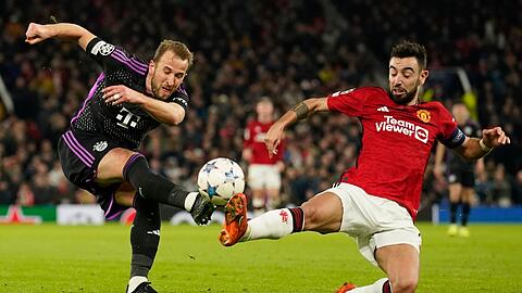 Bayern-Stürmer Harry Kane (l) hatte bei seiner Rückkehr auf die Insel kein Abschlussglück.
