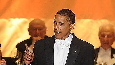 Bei einem Dinner fordert Obama seine Anhänger auf, wachsam zu bleiben