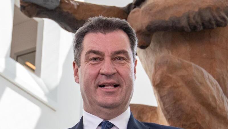 Markus Söder (CSU) steht vor dem Oktoberfest-„Löwenbräu-Löwen“ im Museum der Bayerischen Geschichte. Foto: Armin Weigel Markus Söder (CSU) steht vor dem Oktoberfest-„Löwenbräu-Löwen“ im Museum der Bayerischen Geschichte. Foto: Armin Weigel