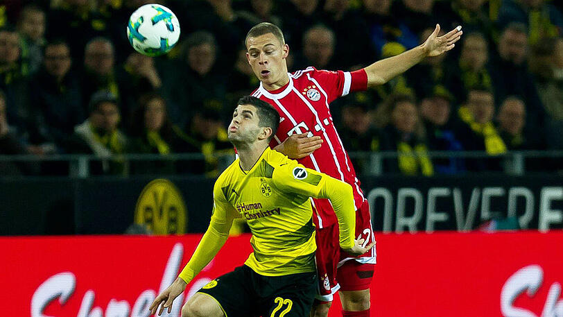 Joshua Kimmich: Note 3. Blitz-Genesung: Reiste erst am Spieltag an, litt am Freitag noch unter Magenproblemen. Bekam zur Begrüßung den Ellbogen von Marcel Schmelzer ab. Wirkte nicht beeinträchtigt, marschierte nach vorne wie hinten mit voller Power. Bereitete das 2:0 von Robert Lewandowski perfekt vor. Aber: Beim 1:3 war er zu zaghaft.