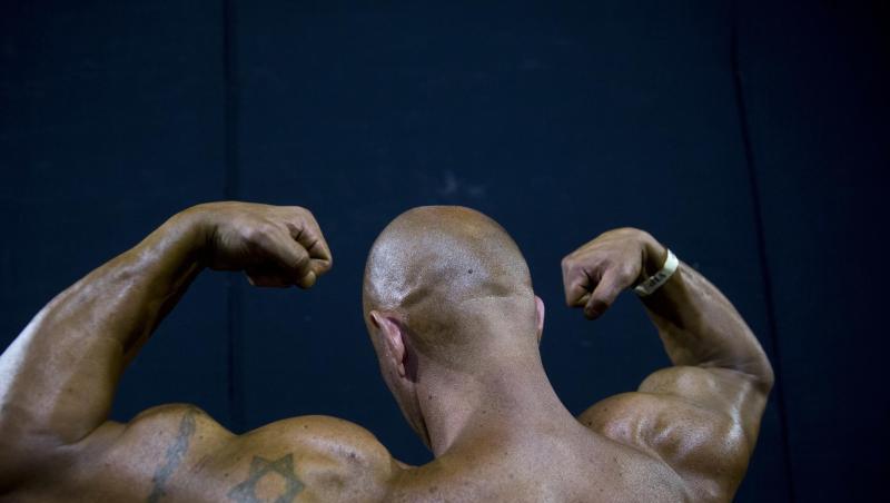 Ein Bodybuilder spannt die Muskeln. Foto: Oded Balilty/AP/Archiv Ein Bodybuilder spannt die Muskeln. Foto: Oded Balilty/AP/Archiv