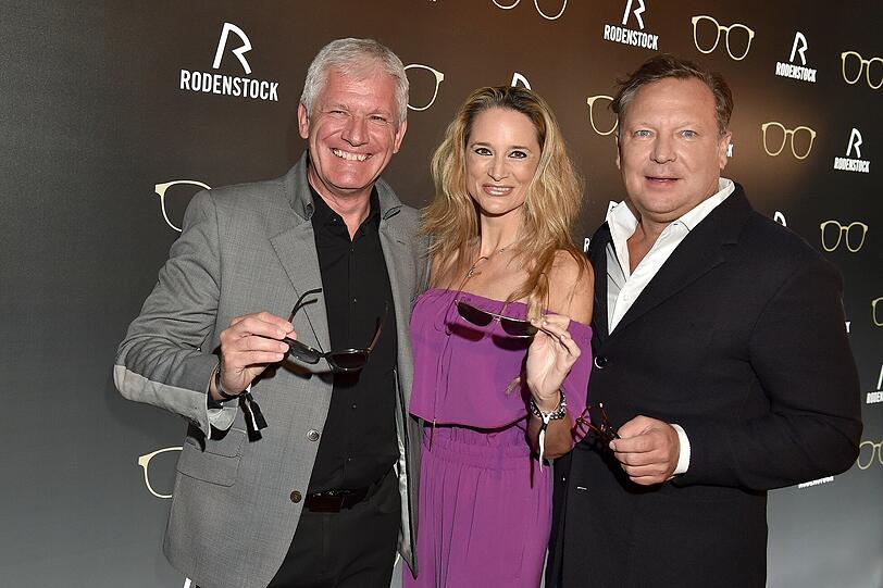 Oliver Kastalio (CEO Rodenstock) mit Ehepaar Schumacher.