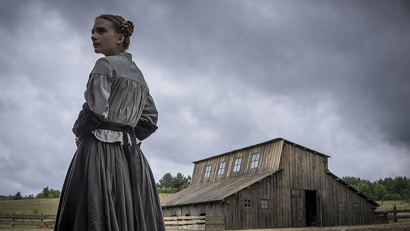 Liz (Dakota Fanning) lebt ein beschauliches Leben - bis der Reverend in ihrer Stadt auftaucht.