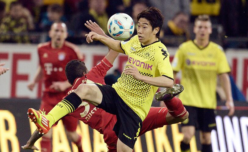 Es war das mit Spannung erwartete Gigantenduell, das vorgezogene Finale der Bundesliga - Dortmund gegen Bayern: die Bilder vom Spiel.