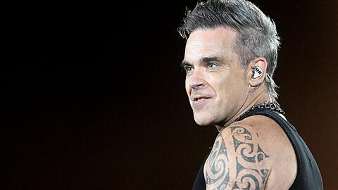 Robbie Williams live auf der Bühne am 27.08.2022 in München auf dem Messegelände.