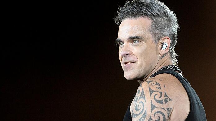 Robbie Williams live auf der Bühne am 27.08.2022 in München auf dem Messegelände.